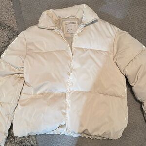 a new day shiny white jacket